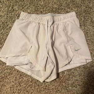 White Nike shorts